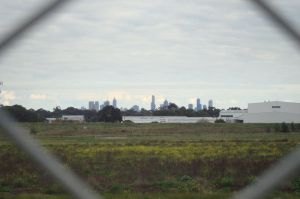 City skyline view over Wetlands & drainage basin where Upfield Bikepath meets the Western Ring Road